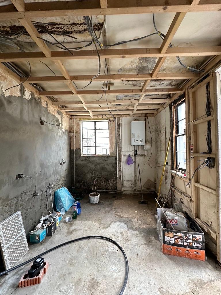 Kennington property before renovation, stripped back to joists with new boiler
